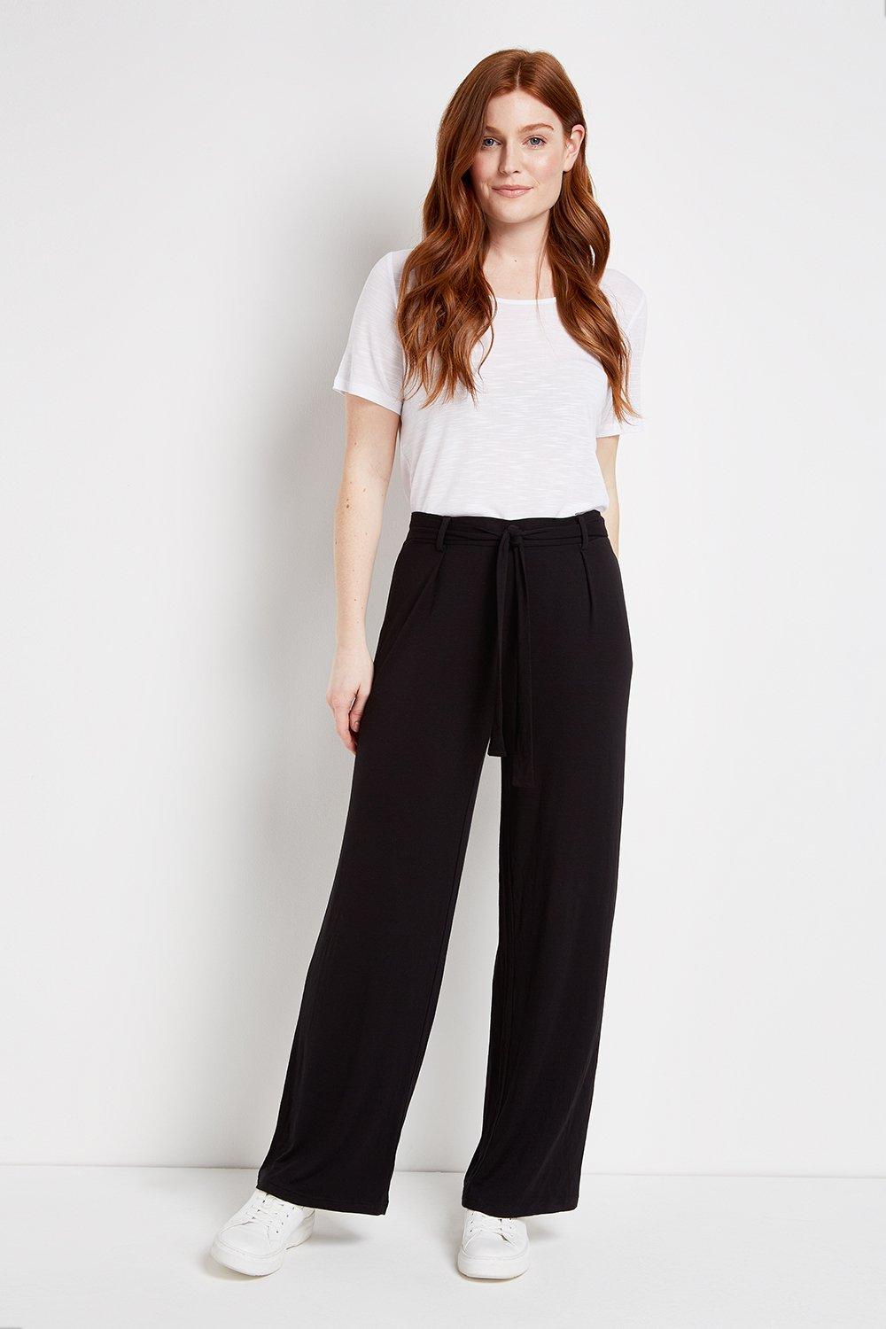 Refresh Your Wardrobe Staples With These Classic Black Trousers. A Wide Leg Cut Gives These A Contemporary Feel, Whilst A Sleek Black Hue Keeps Them Sophisticated.  Trousers Wide Leg Relaxed Casual 94% Viscose,6% Elastane Machine Washable
