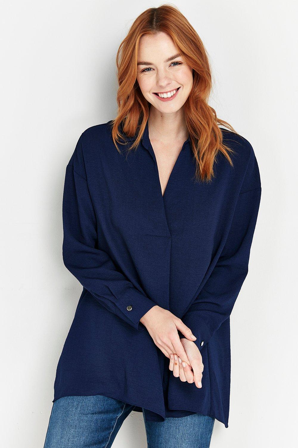 The Versatile Shirt To Add To Your Collection. A Deep Navy Hue Is Timeless And Easy To Pair, Whilst A Relaxed Floaty Fit Means This Can Be Dressed Up Or Down With Ease.  Shirt V-Neck Long Sleeve Relaxed Casual 100% Polyester. Machine Washable.