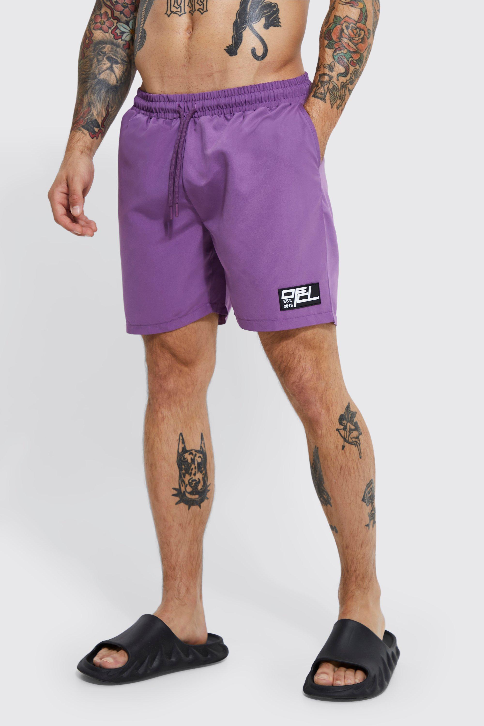 short de bain mi-long à logo en caoutchouc homme - violet - m, violet