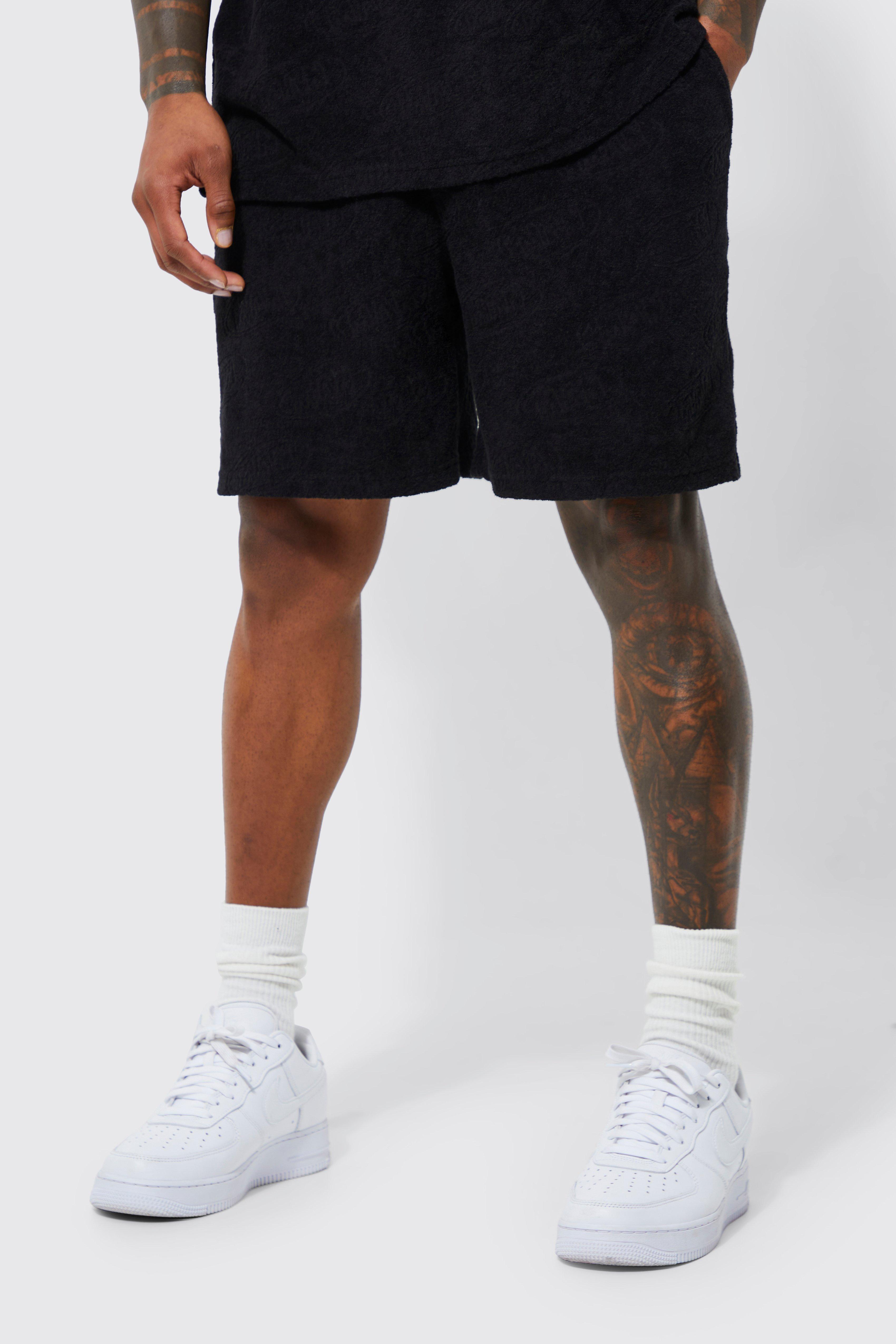 Mens Black Oversized Fit Debossed Man Shorts, Black