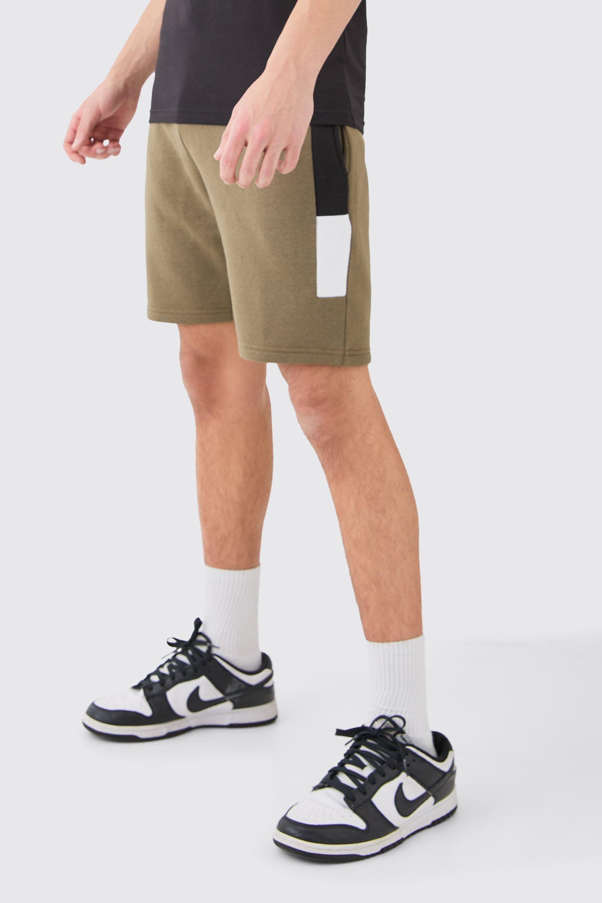Image of Pantaloncini Slim Fit a blocchi di colore con firma Man, Verde