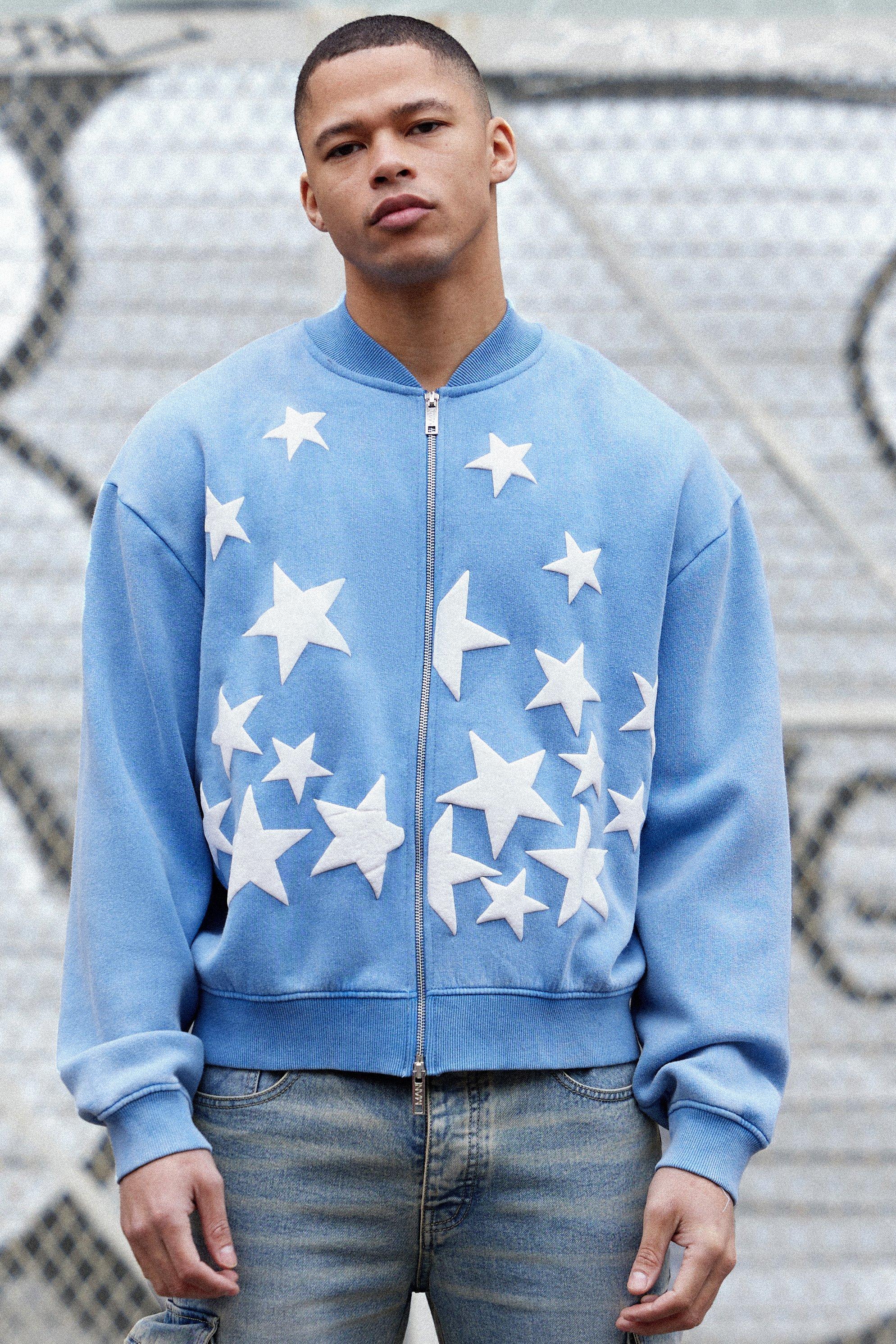 Image of Giacca Bomber squadrata oversize in jersey in lavaggio acido con applique a stella, Azzurro