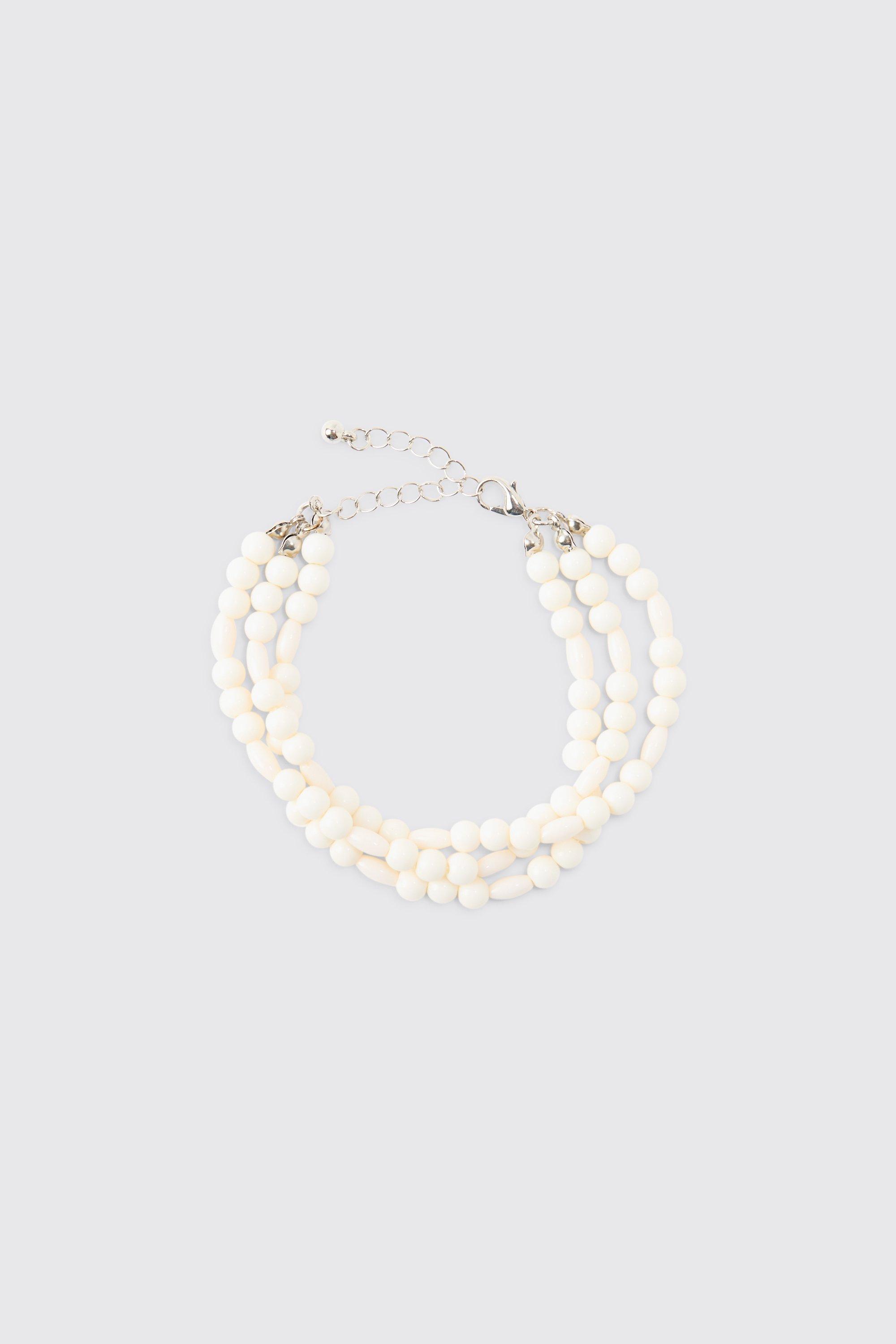 Image of Bracciale a più fili di perle bianche, Bianco