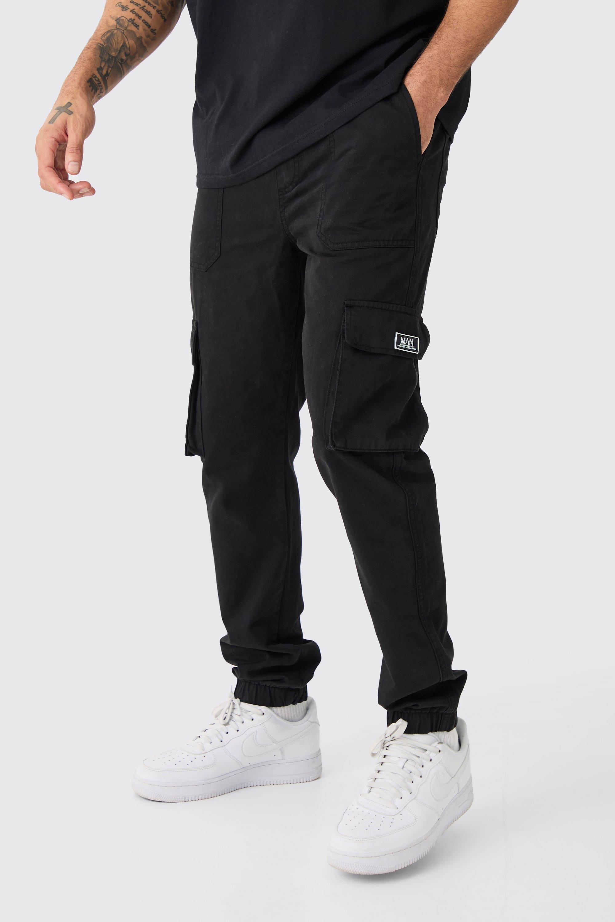 Image of Pantaloni tuta Cargo Slim Fit con elastico in vita e stemmi, Nero