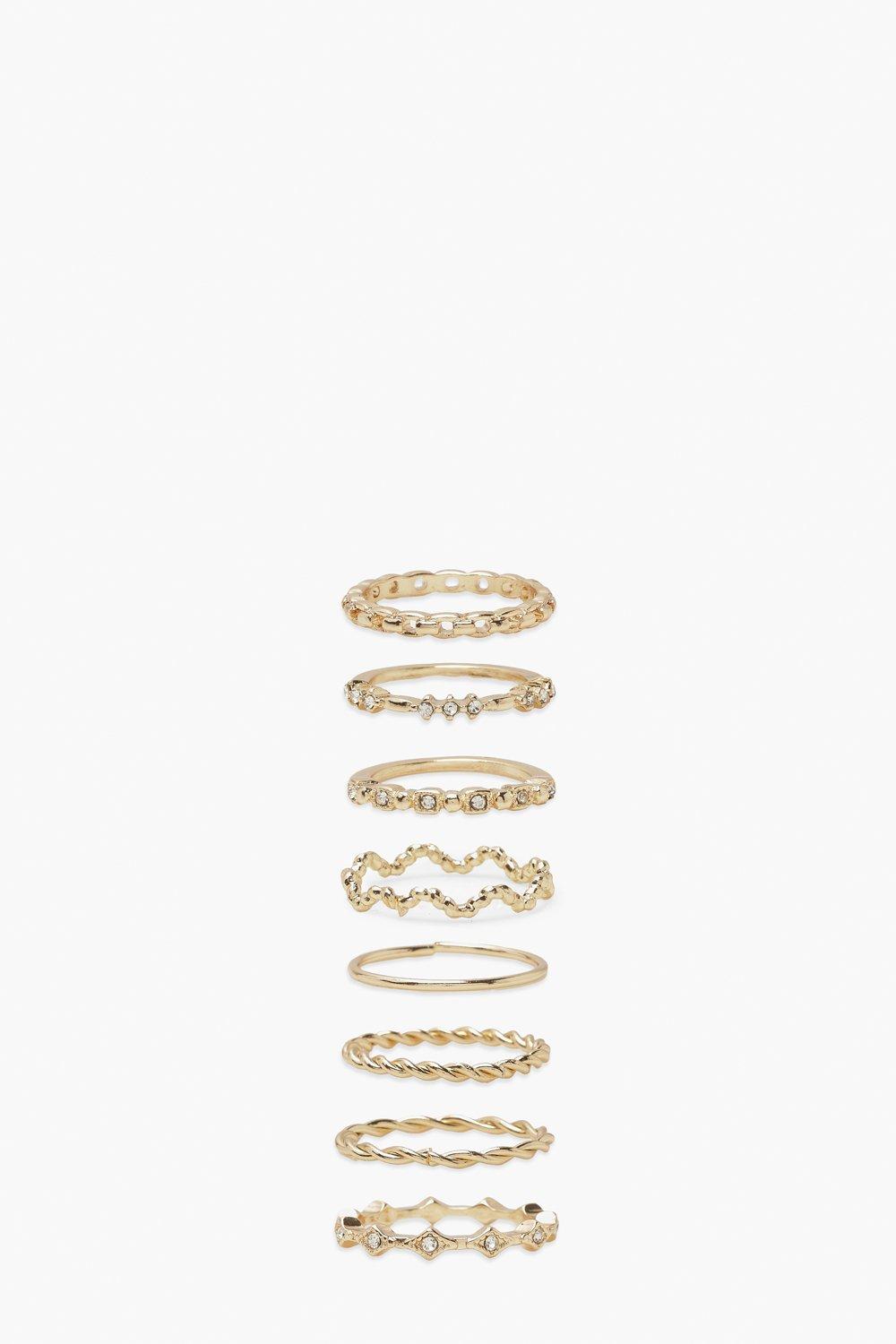 Image of Set di anelli attorcigliati con onde, Oro