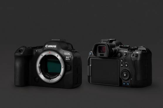 The front and back of a Canon EOS R6 Mark II against a dark background.