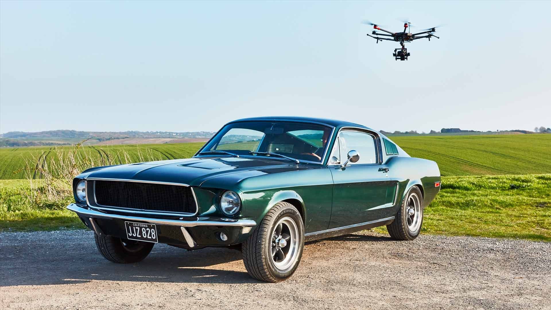 Drone flying over a vintage car