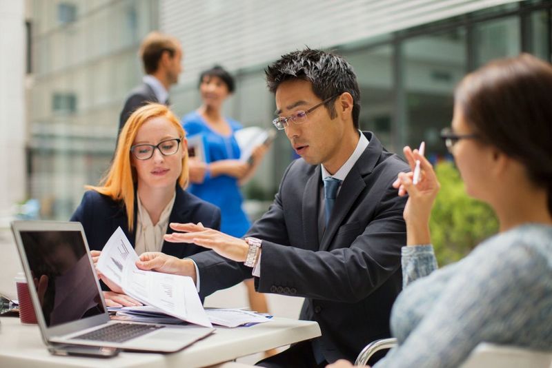 work professionals reviewing documents