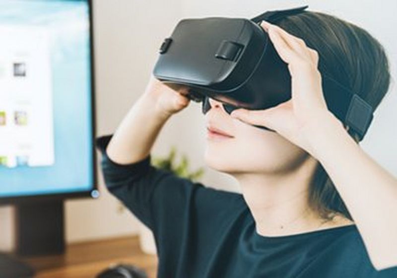 Woman wearing virtual reality headset