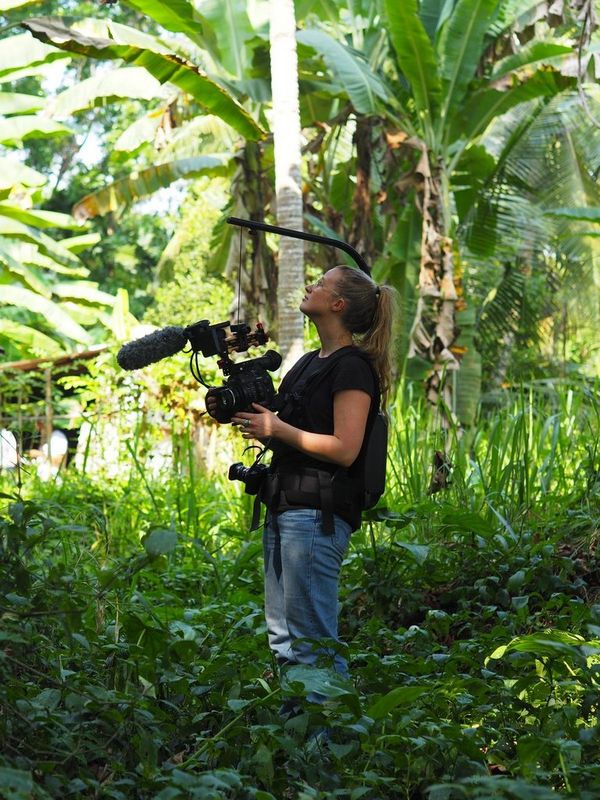 Documentary filmmaker Alice Aedy filming with a Canon EOS C300 Mark II in Sri Lanka.