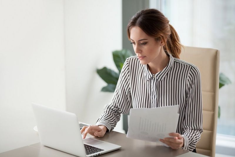 woman looking at laptop 