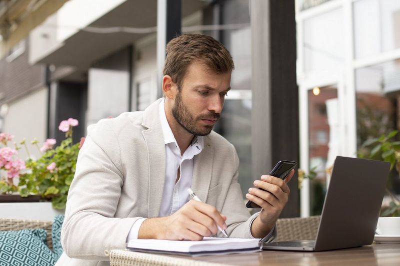 Man creating a strategy in the hybrid working era.