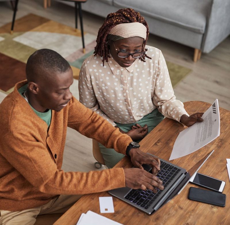 Work professionals discussing why paper choice matters 