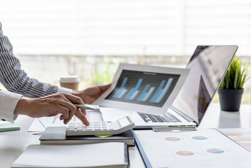 Work professional reviewing documents in the office