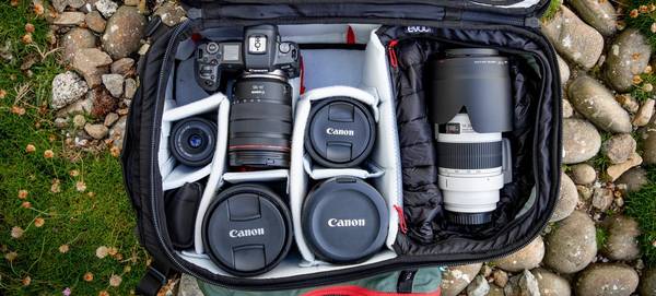 Canon Ambassador Richard Walch's kitbag, containing Canon cameras and five lenses.