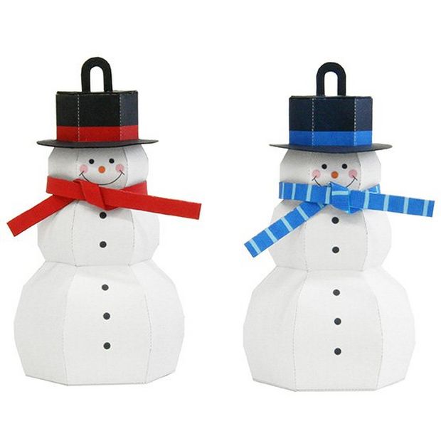 Two homemade cardboard snowman decorations, one with a blue scarf and one with red.