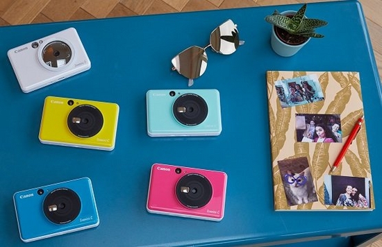 Five colourful Canon Zoemini instant cameras.