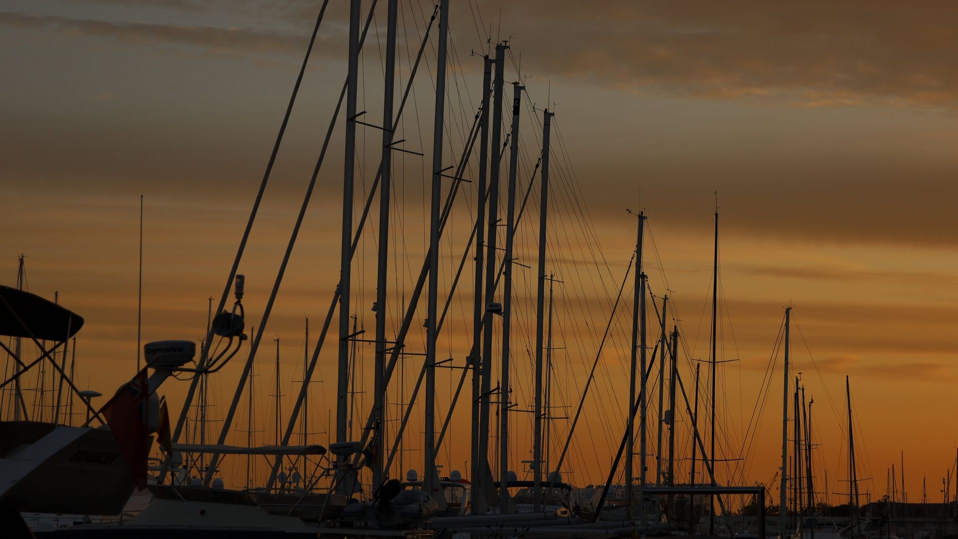 Shot on RF 24-105mm F4-7.1 IS STM of sailing boat masts at sunset