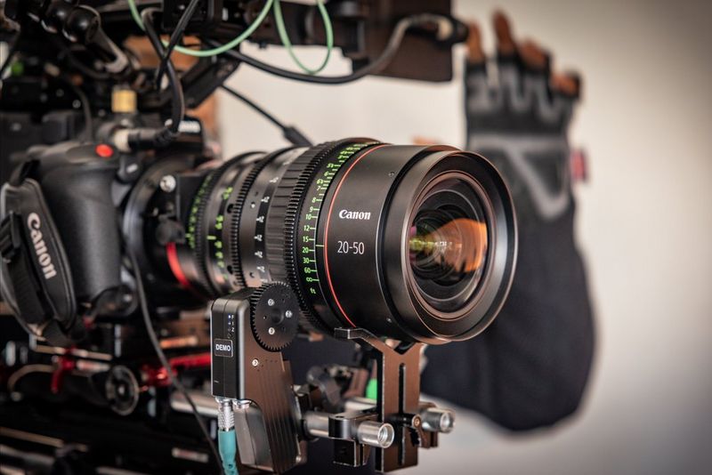 A close-up of the Canon CN-E20-50mm T2.4 L F / FP lens attached to a Canon camera.