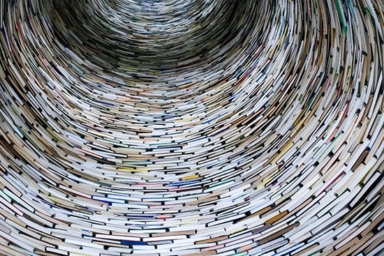 books stacked in the shape of a tunnel