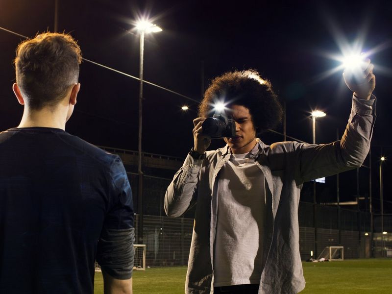 Capturing the stadium with speedlite range