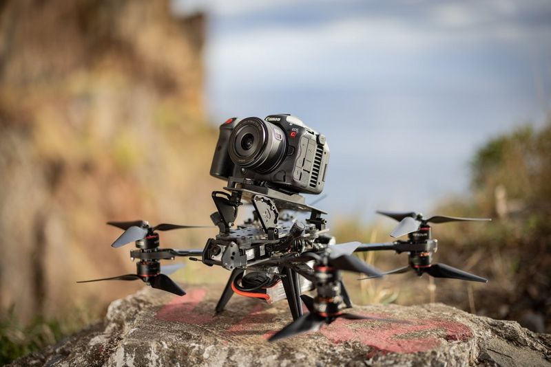 A Canon EOS R5 C hybrid camera attached to a drone.
