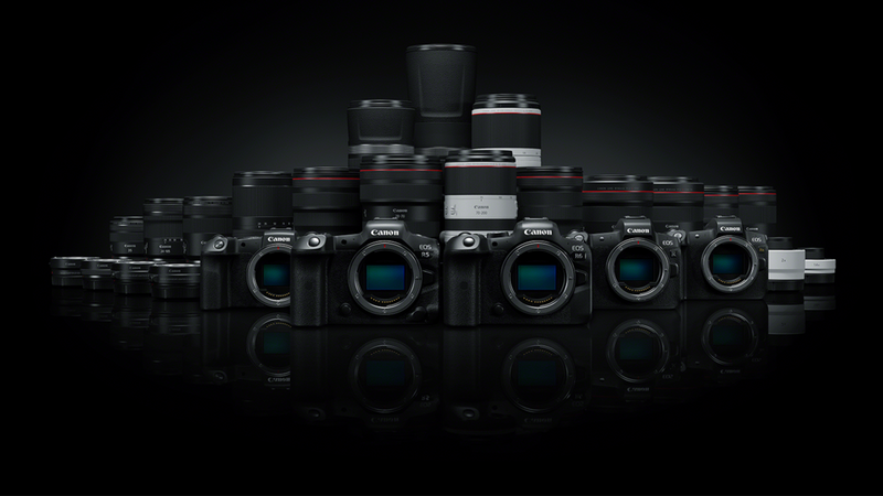 A range of Canon cameras and lenses on black background.
