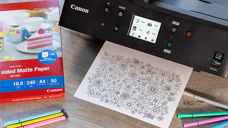 PIXMA printer and colouring paper printout.