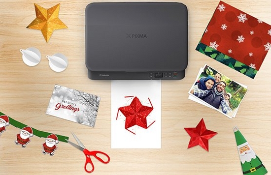 PIXMA printer on a table surrounded by festive season ideas