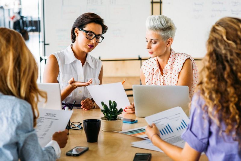 Business women looking at documents in a office