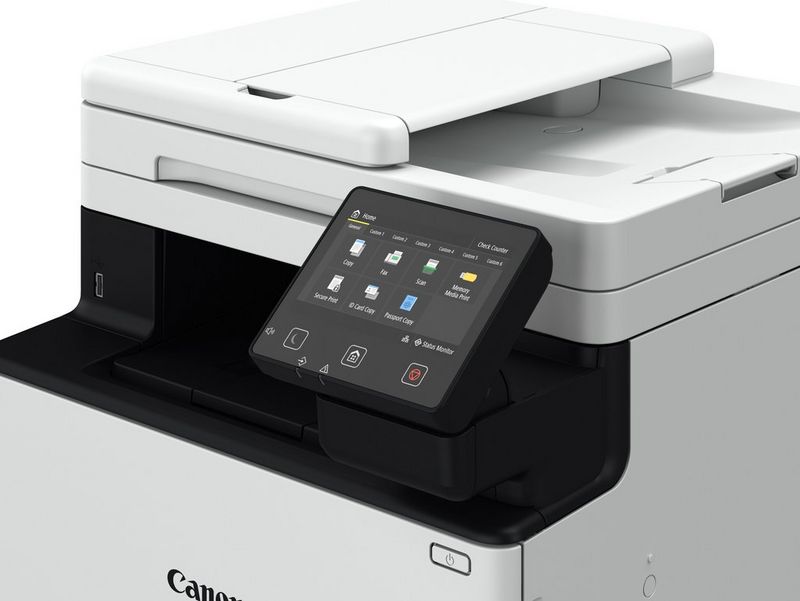A close-up of a Canon i-SENSYS printer and its touchscreen control panel.