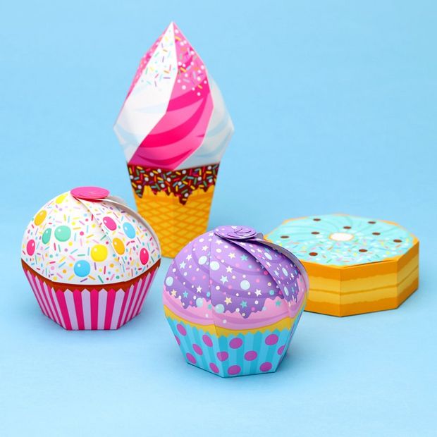 Papercraft boxes folded to resemble sweet treats.