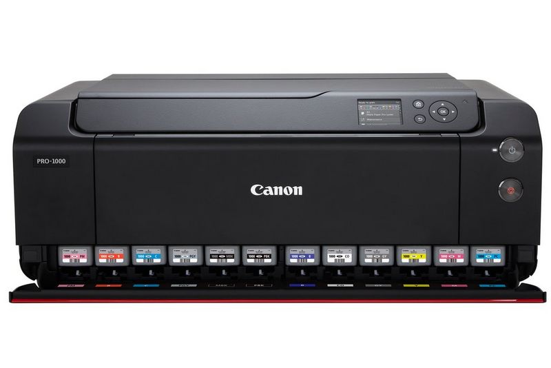 A Canon imagePROGRAF PRO-1000 printer, with its 12 ink tanks visible at the front.