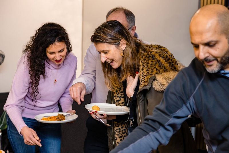Group of people at a food buffet