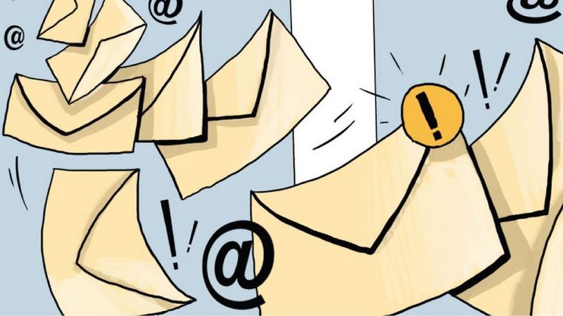 Images of letters with warning signs symbolising security risks with hybrid working 