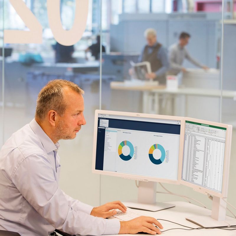 Work professional using PRISMAlytics Accounting software.