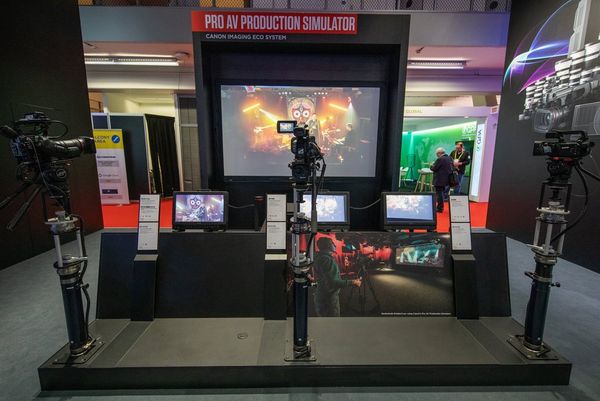A Canon camera and two camcorders on the Pro AV production simulator stand at ISE 2020.