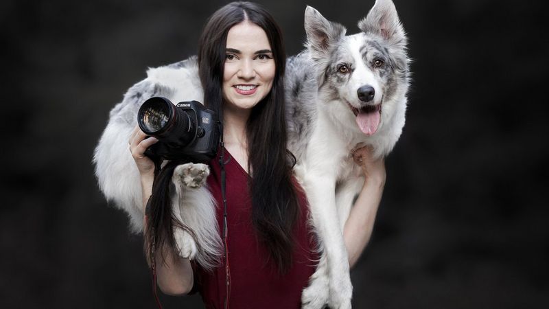 A headshot of Canon Ambassador Alicja Zmysłowska with a dog.