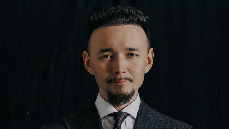 A headshot of Canon Ambassador Askar Bumaga.