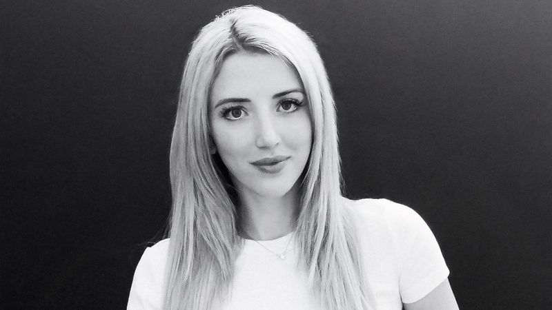 A black and white headshot of Canon Ambassador Donatella Nicolini.