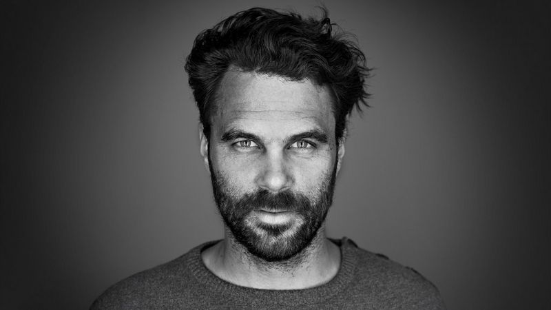  A black and white headshot of Canon Ambassador Nico Schaerer.