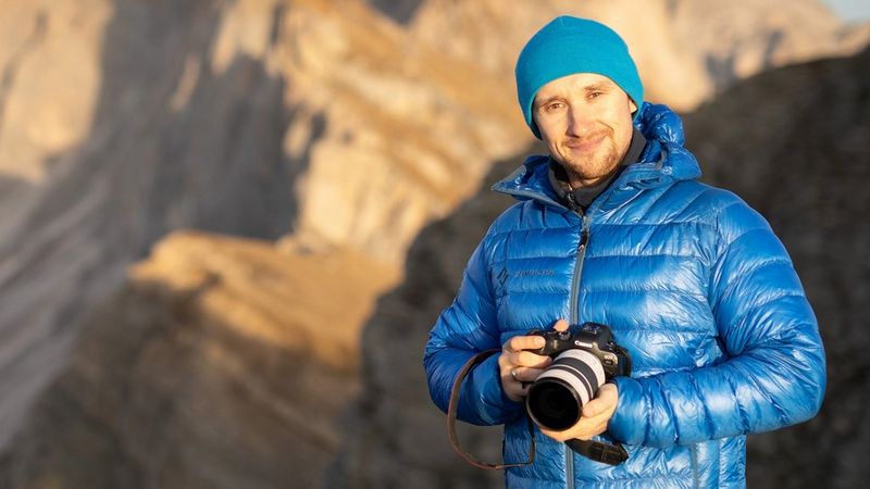 Canon Ambassador Paweł Uchorczak holding a Canon camera