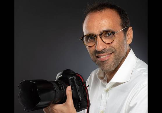 Photographer and Canon Ambassador Karim Tibari with his Canon camera.