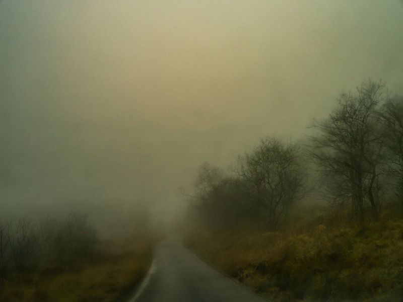 A dark and blurry atmospheric shot of a country road in mid-Wales, by Mohamed Hassan.