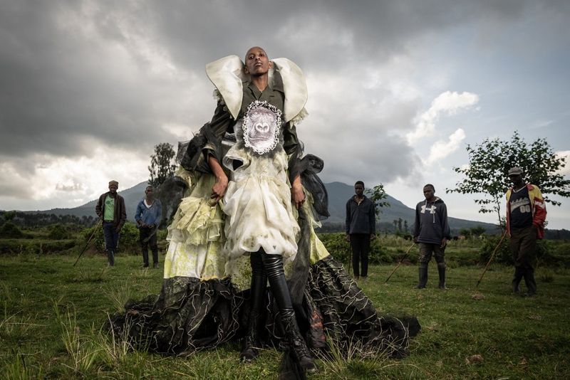 A photo taken by Canon Student Development Programme participant Simon Wohlfahrt of a figure standing in a ruched gown in a field on a cloudy day.