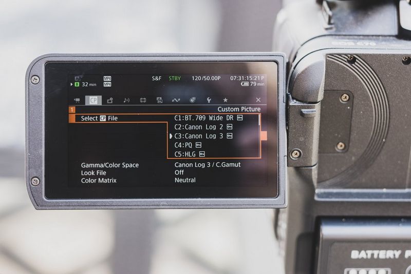 The Custom Picture menu screen of a camera, with Canon Log 3 being selected from a range of options including Canon Log 2, BT.709 Wide DR, PQ and HLG.