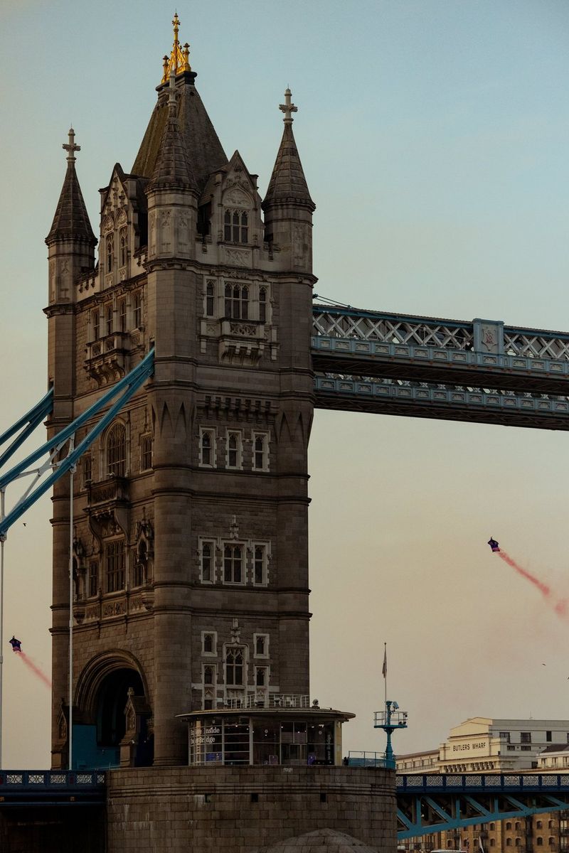 Wingsuiter Marco Fürst or Marco Waltenspiel fly through London's defining landmark Tower Bridge, shot on Canon.