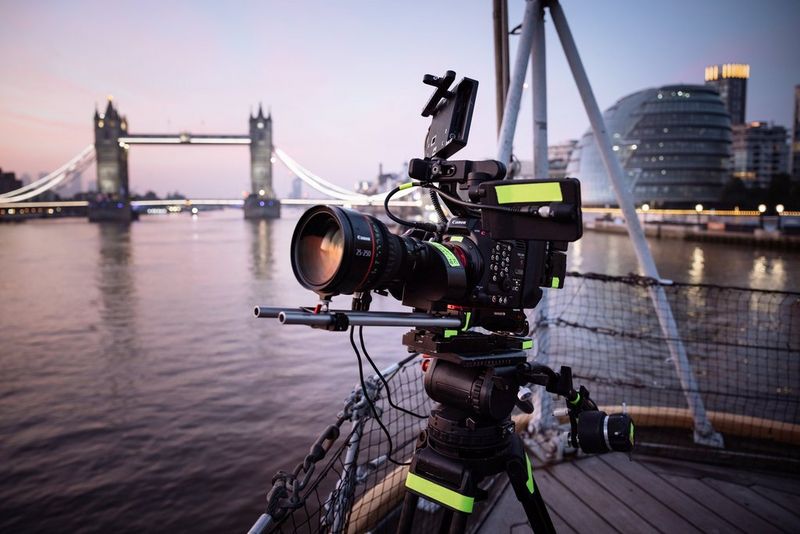 A Canon EOS C300 Mark III with a CN10X25 IAS S len, with Tower Bridge and London City Hall in the background. 