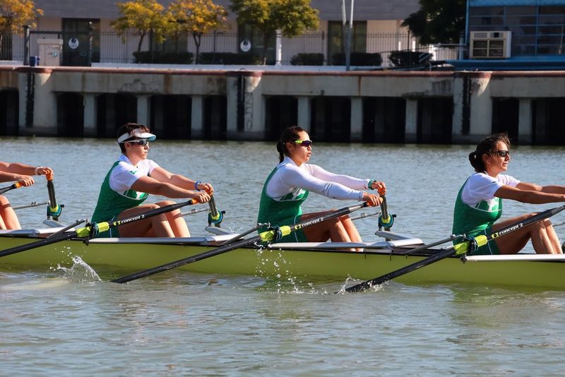 A sharp zoom image of rowers on the water, captured with a Canon RF-S 18-150mm F3.5-6.3 IS STM lens.