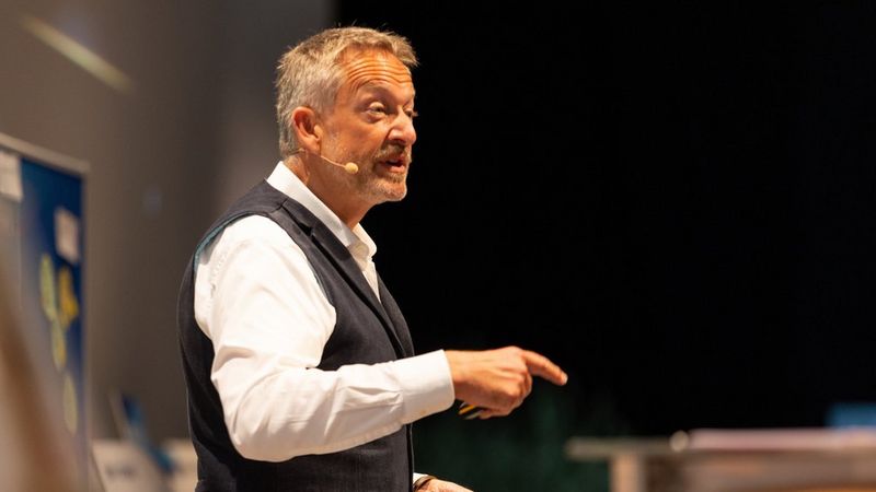 Man speaking at the Future Book Forum